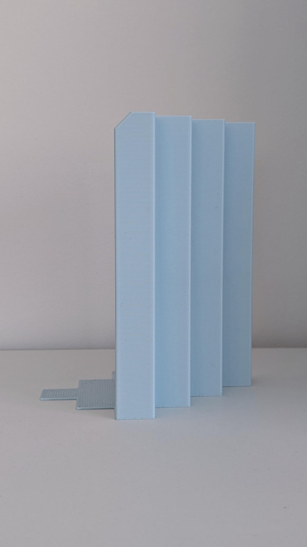 RAW BOOK STOP – Minimalist 3D Printed Bookend by Martin Žampach
